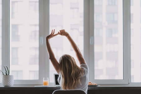Busy woman doing gymnastics for body relaxing